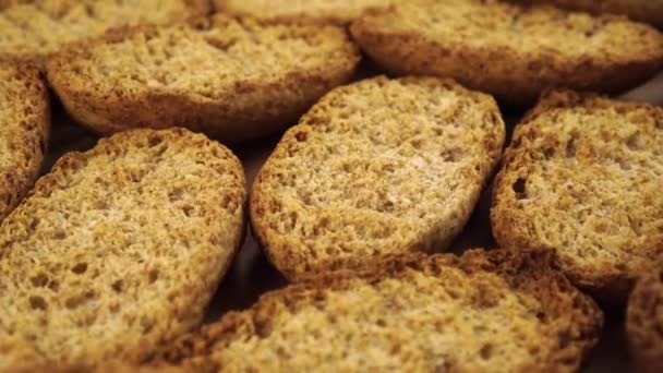 Pile Hard Rusks Dark Dry Bread Close Rotating Baked Crust — Stock Video