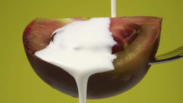 Milk Cream Splashes Pours Slice Ripe Fresh Kumato Tomato Slow — Αρχείο Βίντεο