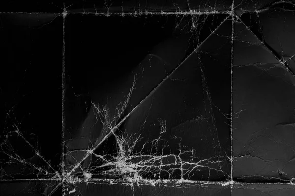 Kırışıklık ve kıvrımlarla siyah katlanmış grunge kağıdı. Eski tozlu karton. Soyut dramatik arkaplan