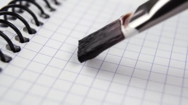 Desenho Linha Bloco Notas Com Página Quadriculada Pincel Com Tinta — Vídeo de Stock