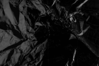 Buruşuk siyah kırışıklık dokusu. Soyut arkaplan