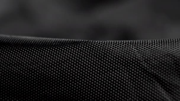 Zmačkaný Černý Syntetický Materiál Tečkovaná Drsná Textura Makro Dolly Shot — Stock video