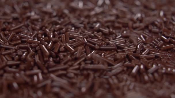 Dark Chocolate Sprinkles Macro Texture Slow Motion Dolly Shot — Stock Video