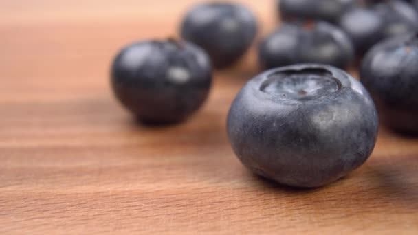 Ripe Blueberries Wooden Surface Macro Dolly Shot — Wideo stockowe