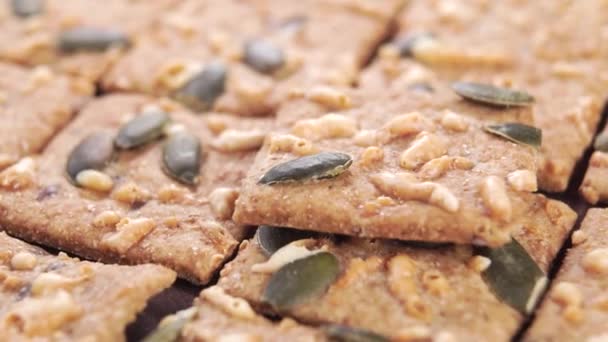 Hand Takes Cereal Rye Crispbread Pumpkin Seeds Cheese Slow Motion — Stock Video