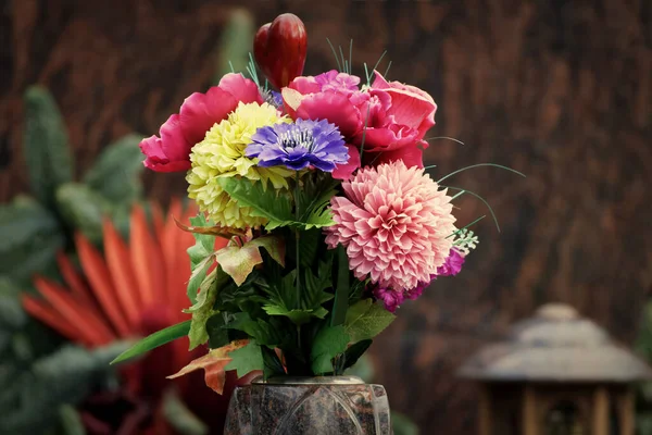 flower decoration at a grave in a cemetery