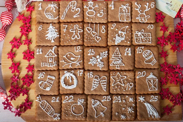 Calendrier de l'Avent, biscuits de Noël Photo De Stock
