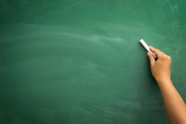 Hand schrijven op een schoolbord — Stockfoto