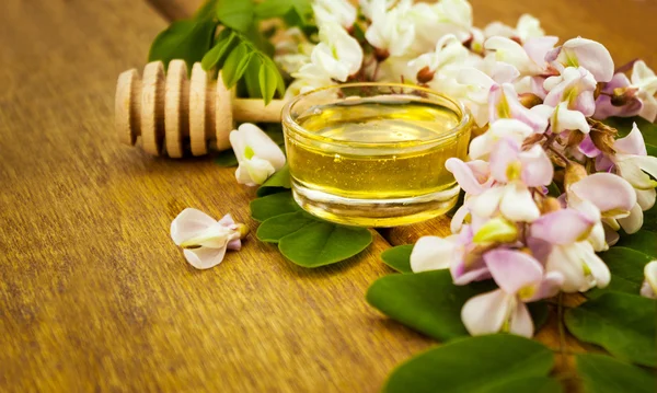 Honey with acacia blossoms — Stock Photo, Image