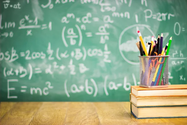 Books and blackboard — Stock Photo, Image