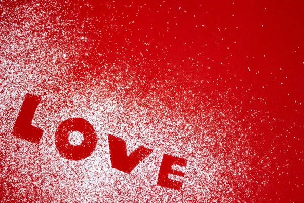 Word LOVE in icing sugar — Stock Photo, Image