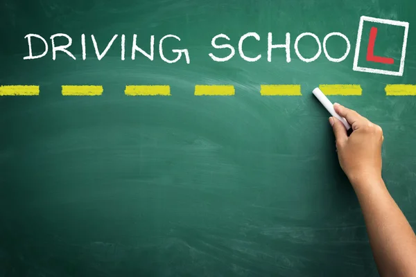 Driving school text skriver blackboard — Stockfoto