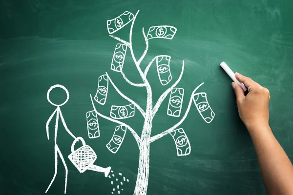 Watering a money tree — Stock Image Watering a money tree Royalty Free Stock Photos