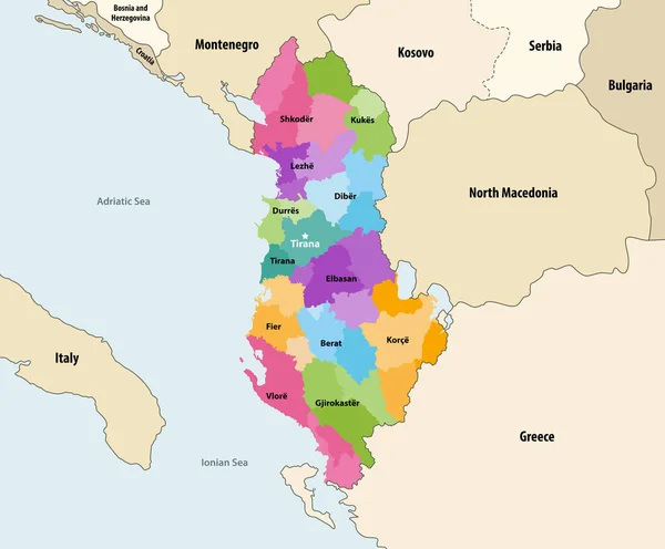 アルバニア行政区画 は近隣諸国 地域との郡ベクトルマップで着色されている — ストックベクタ