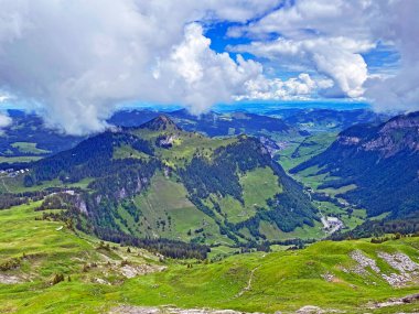 View of the Loch alpine valley over the Iberig region and below the foot of a mountain range First, Oberiberg - Canton of Schwyz, Switzerland (Kanton Schwyz, Schweiz)