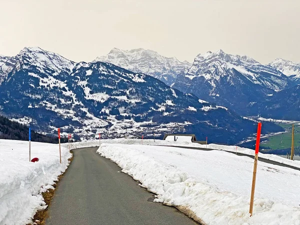Trails for walking, hiking, sports and recreation in the winter environment of the alpine Mattstogg mountain range and over the Lake Walen or Lake Walenstadt (Walensee), Amden - Kanton of St. Gallen, Switzerland (Schweiz)
