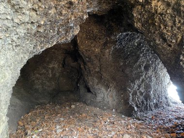 A natural semi-cave and small water tunnels carved into the water along Lake Zurich (Zuerichsee oder Zurichsee), Wadenswil (Waedenswil) - Canton of Zurich (Zuerich), Switzerland / Schweiz