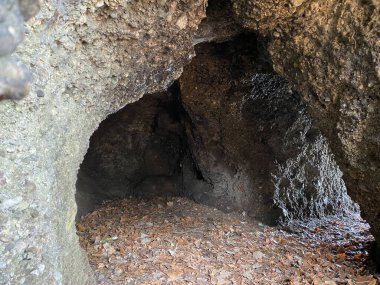 A natural semi-cave and small water tunnels carved into the water along Lake Zurich (Zuerichsee oder Zurichsee), Wadenswil (Waedenswil) - Canton of Zurich (Zuerich), Switzerland / Schweiz