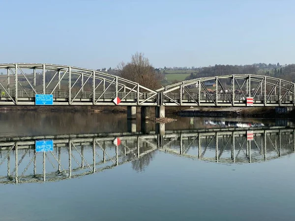 An iron bridge over the river Reuss (Reussbruecke or Reussbrucke) and in the natural protection zone Aargau Reuss river plain (Naturschutzzone Aargauische Auen in der Reussebene), Rottenschwil - Switzerland (Schweiz)