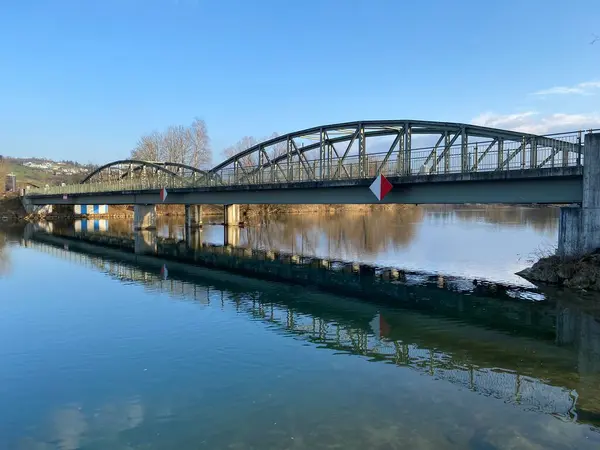 An iron bridge over the river Reuss (Reussbruecke) and in the natural protection zone Aargau Reuss river plain (Naturschutzzone Aargauische Auen in der Reussebene), Rottenschwil - Switzerland (Schweiz)