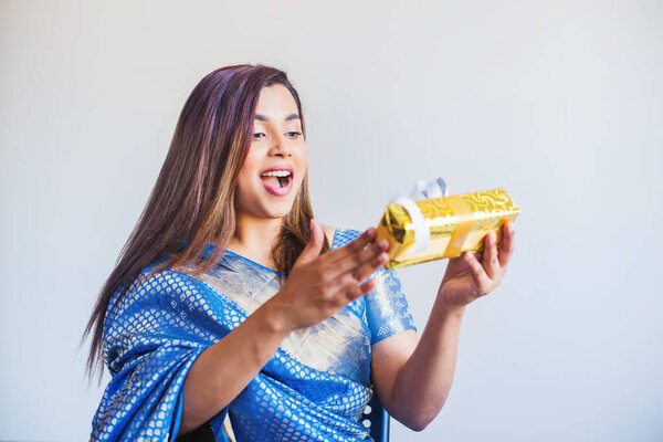 Young Indian Woman Saree Receiving Surprise Gift Stock Photo