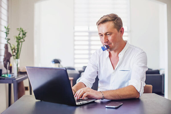 Handsome Caucasian Man Holding Credit Card His Mouth Shopping Online Royalty Free Stock Images