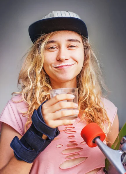 Woman drinking milk — Stock Photo, Image