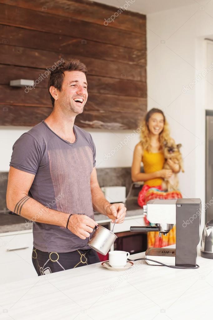 Man making coffee for his girlfriend