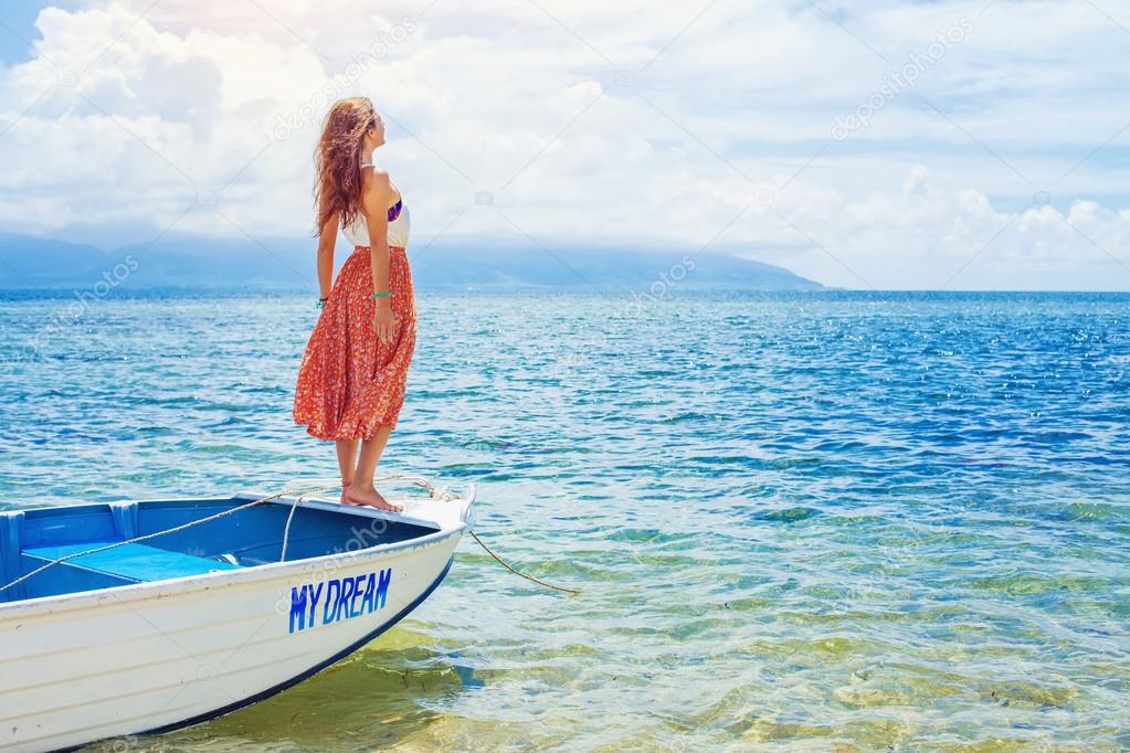 Woman sailing on a beautiful boat
