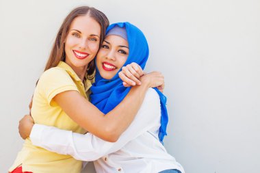 muslim and christian girl together clipart