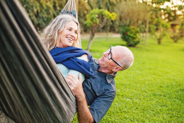 Senior european couple  lying  in hammock