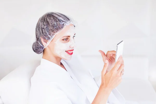 woman doing face mask