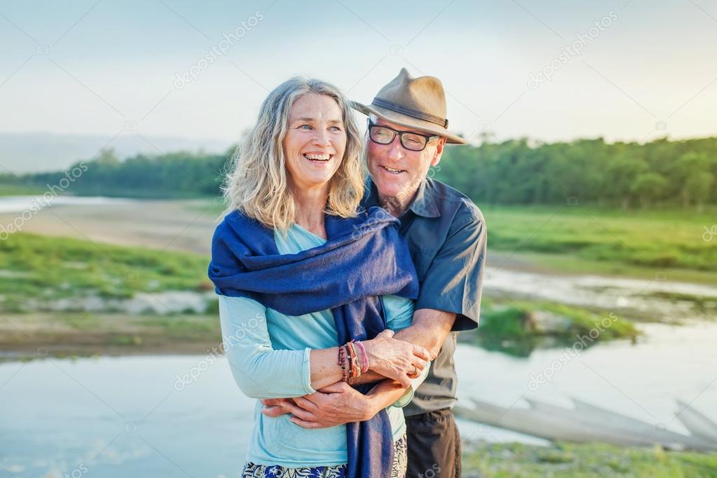 mature couple  on the river