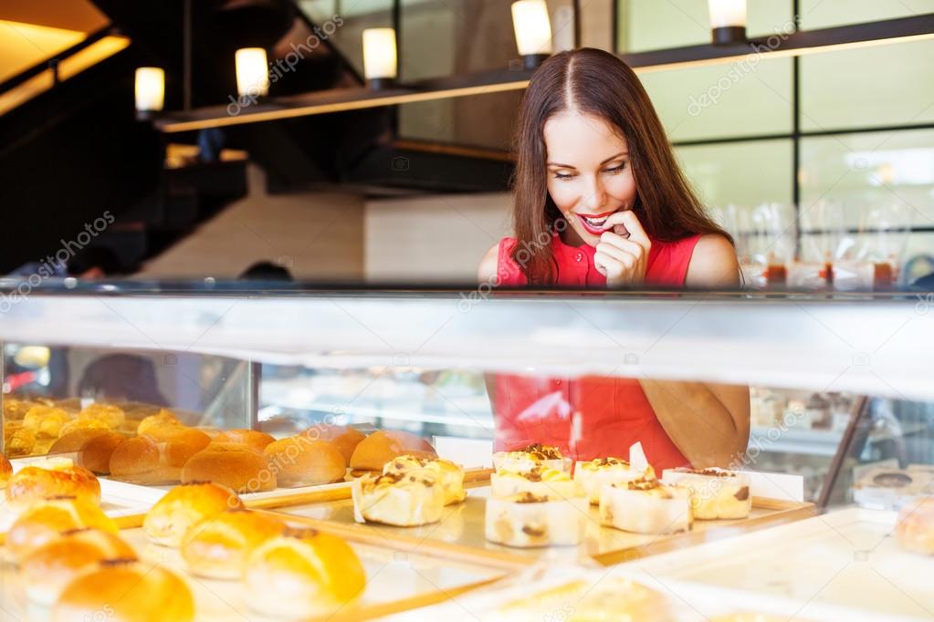 woman choosing bakery