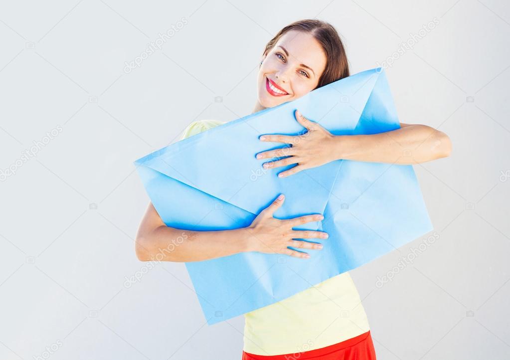 woman receiving big envelope