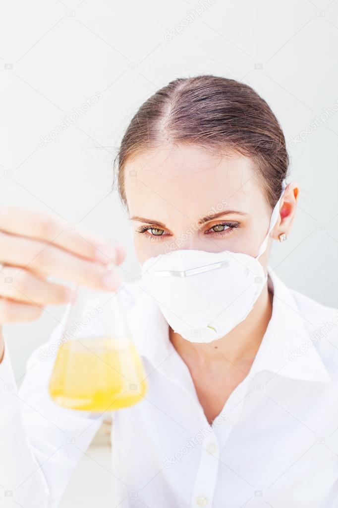 scientist holding a flask