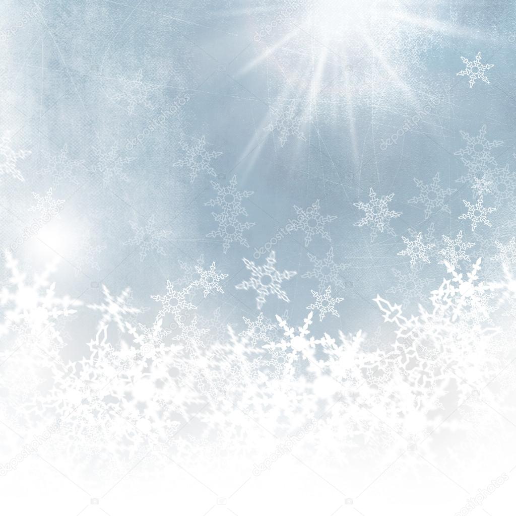 Snowflakes background - light blue abstract winter background