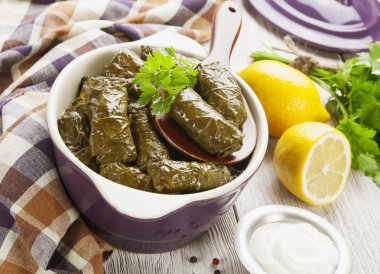 Dolma in the ceramic pot clipart