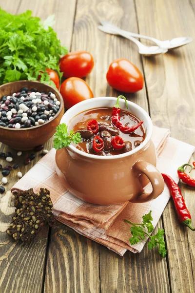 Chili soup with red beans and greens — Stock Photo, Image
