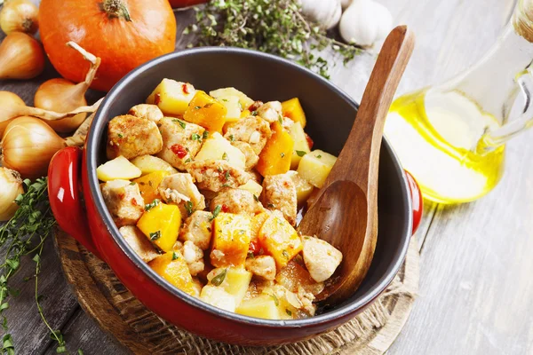 Chicken stew with pumpkin, potatoes and spices — Stock Photo, Image