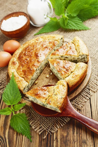 Pie with nettles — Stock Photo, Image