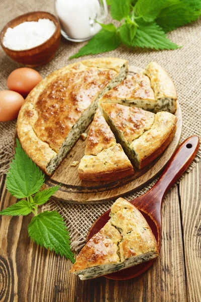 Pie with nettles — Stock Photo, Image