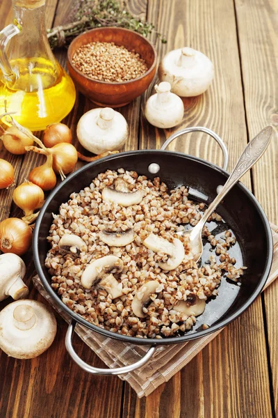 Buckwheat porridge with mushrooms — Stock Photo, Image