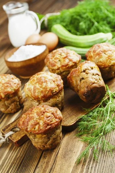 Muffins with zucchini, cheese and herbs — Stock Photo, Image