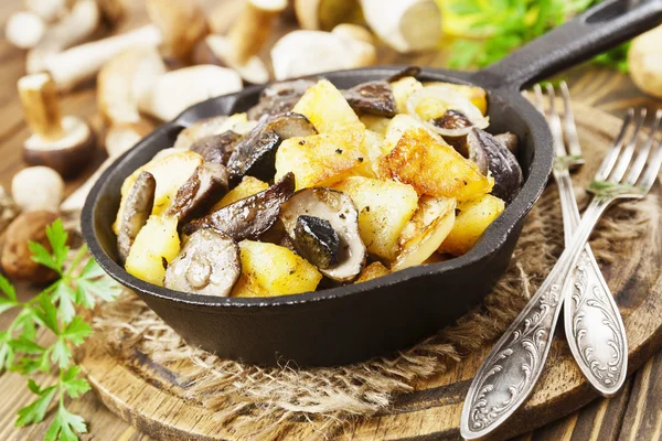 Fried potatoes with mushrooms