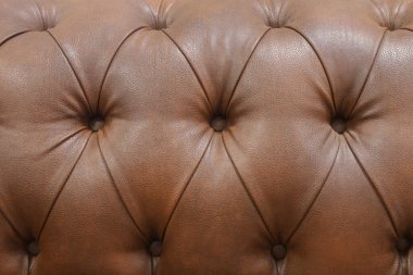 Chesterfield premium lüks kahverengi deri arka plan vagon kravat kapitone insanlar yakın olmadan