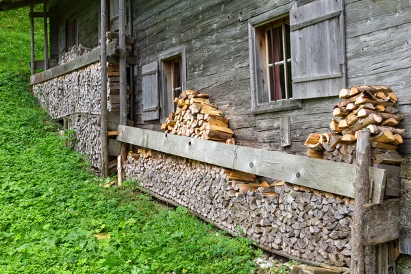 Firewood stacked in a old alpine hut near Falzthurnalm. Achensee Lake area, Austria, Tirol — Stock Photo, Image