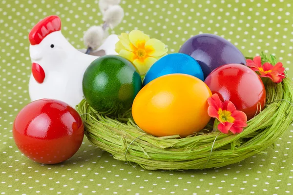Easter arrangement on a polka dot tablecloth — Stock Photo, Image