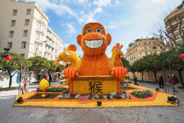 MENTON, FRANCE - FEBRUARY 20: Chinese horoscope monkey, mouse and rooster made of oranges and lemons on Lemon Festival (Fete du Citron) on the French Riviera.The theme for 2015 was 