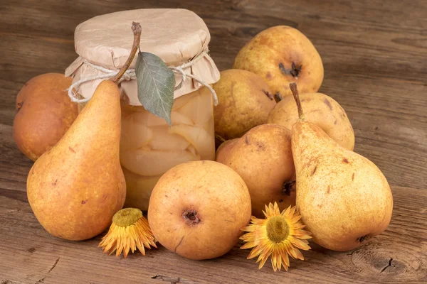 Homemade pears compote or jam rustic still life